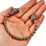 Scottish Thistle bronze bracelet shown in hand for size and detail