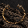 Scottish Thistle bronze armring full view on dark rustic wood background