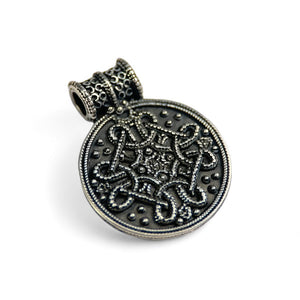 Birka Viking silver pendant on a white background