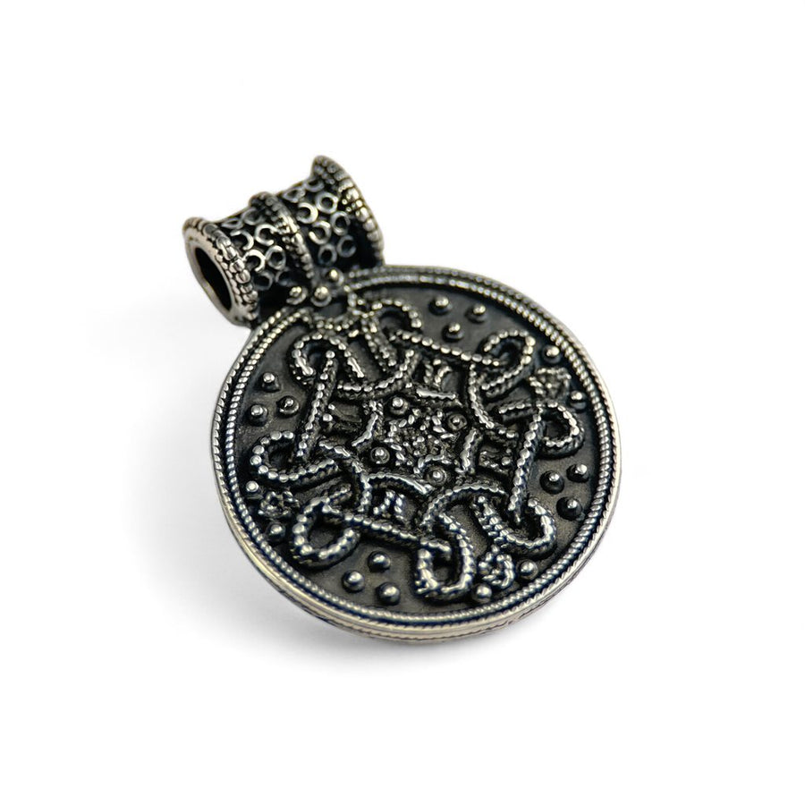 Birka Viking silver pendant on a white background