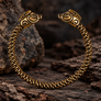 Collach Pictish Boar bronze bracelet inspired by Dunadd Scotland on natural stone