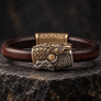 Skoll and Hati bronze wolf bracelet with dark brown leather, angled premium Northlord product photo