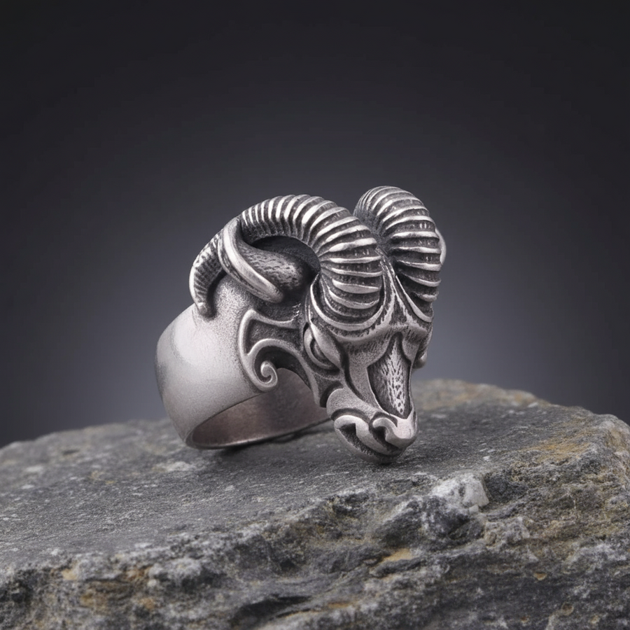 Silvered bronze Thor's Goat head ring on a white background