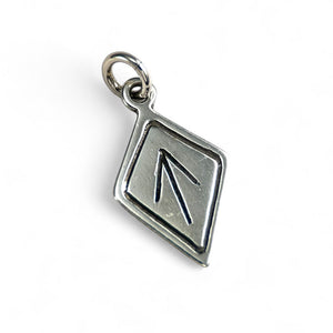 Silver Tiwaz pendant with a kite design on a white background