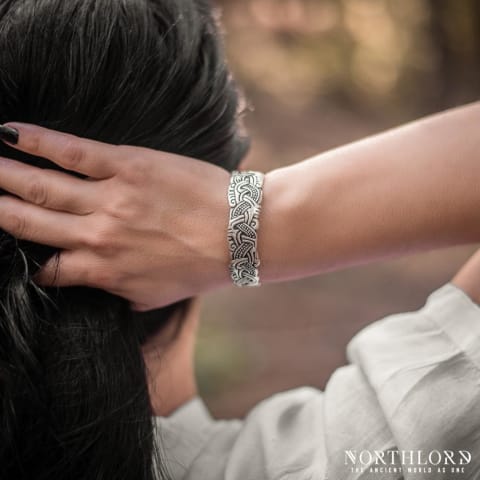 A female model posing while wearing a Viking bracelet inspired by historical artifacts - Northlord (2)
