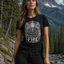 Woman wearing Freya’s Fire Viking t-shirt in a mountain forest setting