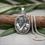 lose-up detail of Poseidon 925 sterling silver pendant showing trident and beard relief engraving