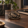 Sleeping Rats bronze miniature sculpture displayed on a dark wooden office desk