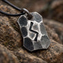 Hand forged Sowulo rune pendant in steel on natural stone